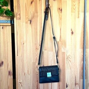 Purse with gold hardware and stone clasp